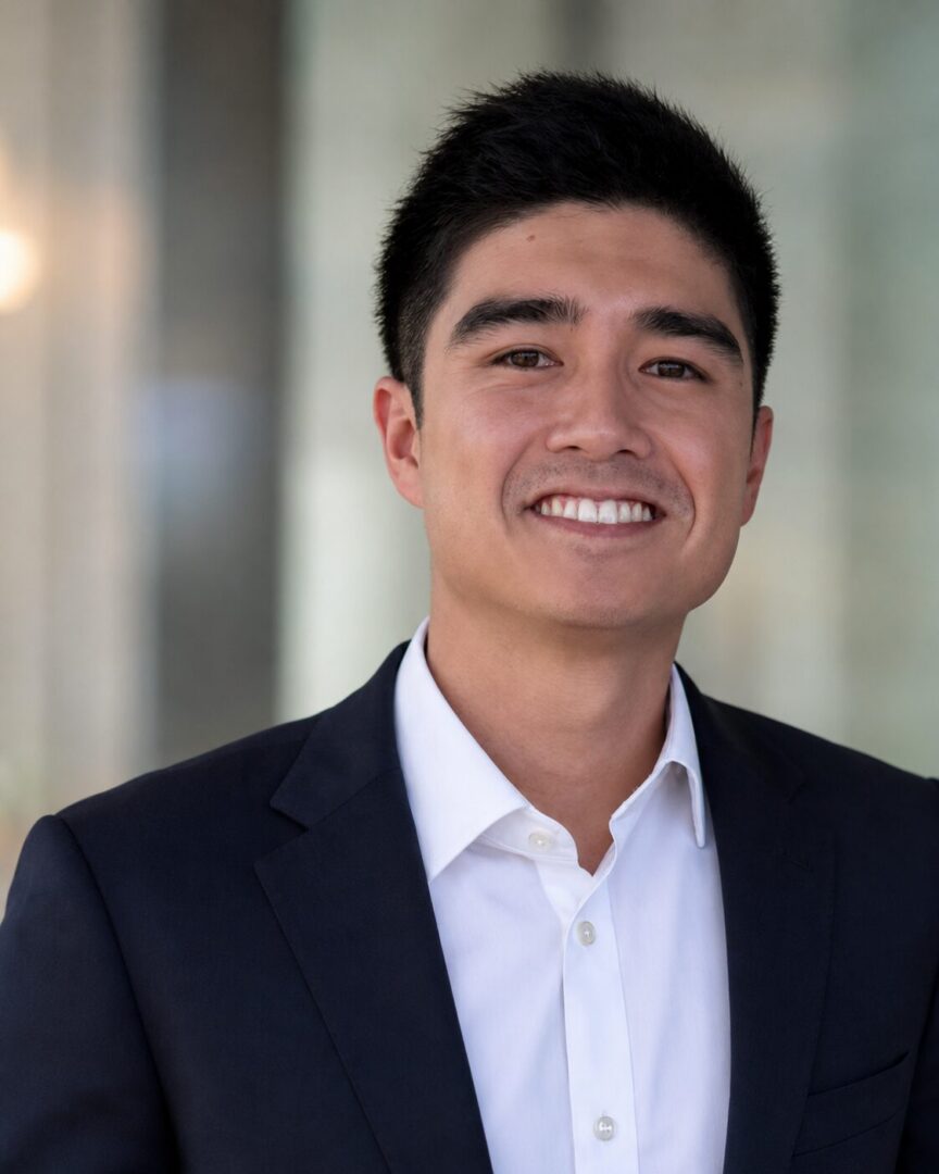 Smiling professional headshot of young man