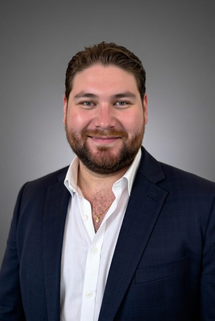 Smiling man in suit professional headshot